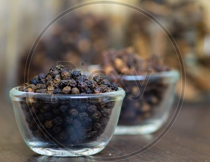 View Of Black Peppercorns In A Bowl. Black Pepper Boost Immunity Naturally. Selective Focus.