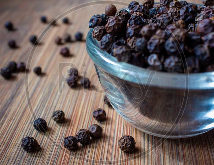 View Of Black Peppercorns In A Bowl. Black Pepper Boost Immunity Naturally