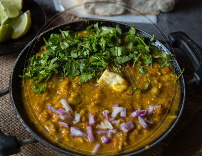Close up of Indian snacks pav bhaji or bread masala curry