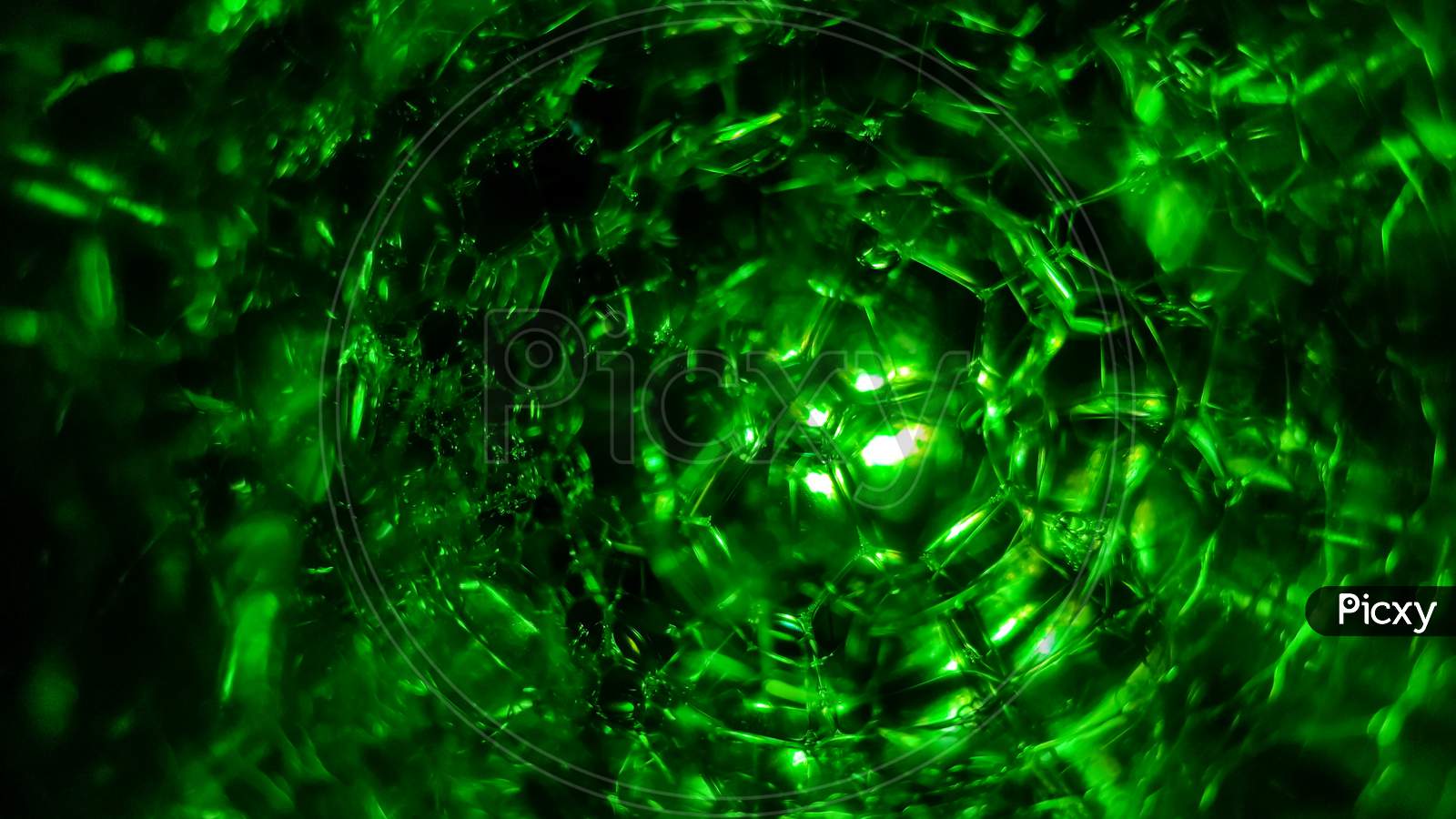 Abstract Of Green Soap Bubbles In Dark