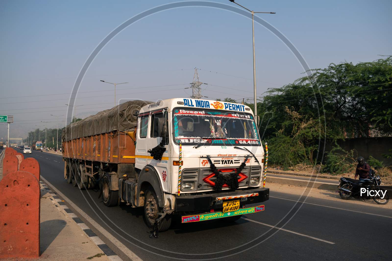 A truck or lorry carrying loads on highway