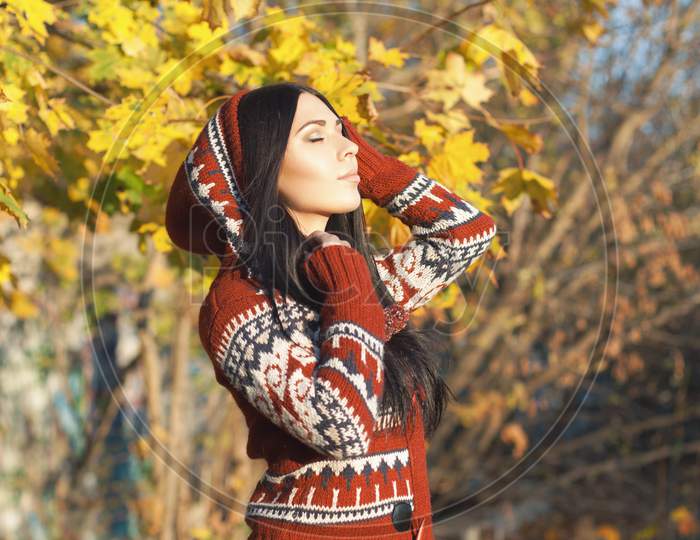 Beautiful Girl In The Hood In Autumn