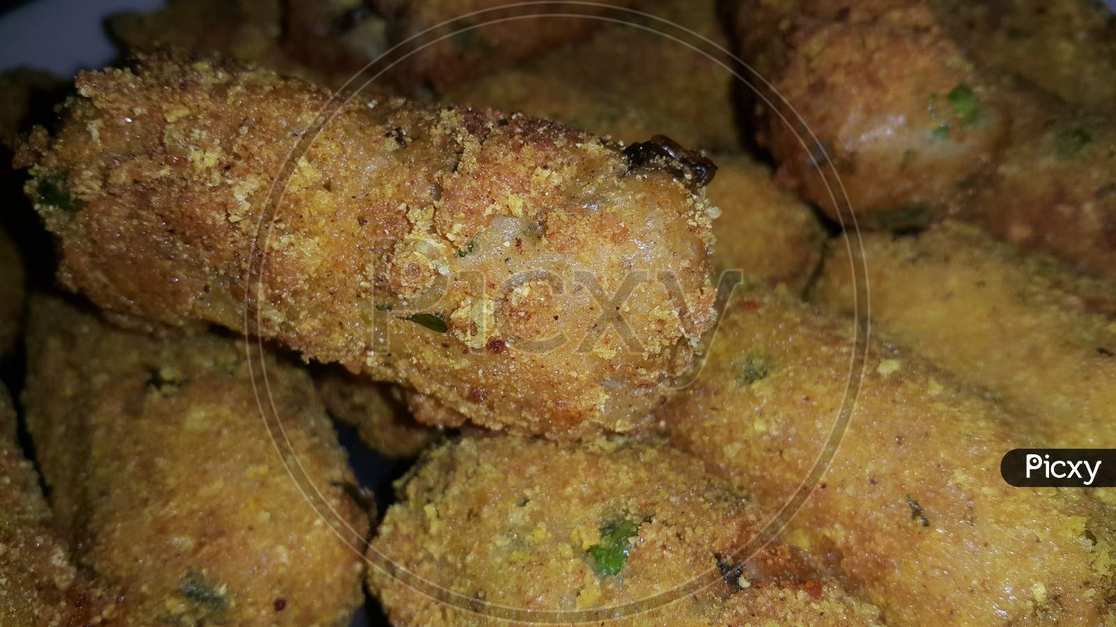 Spicy And Delicious Fried Croquettes With A Closeup Perspective View
