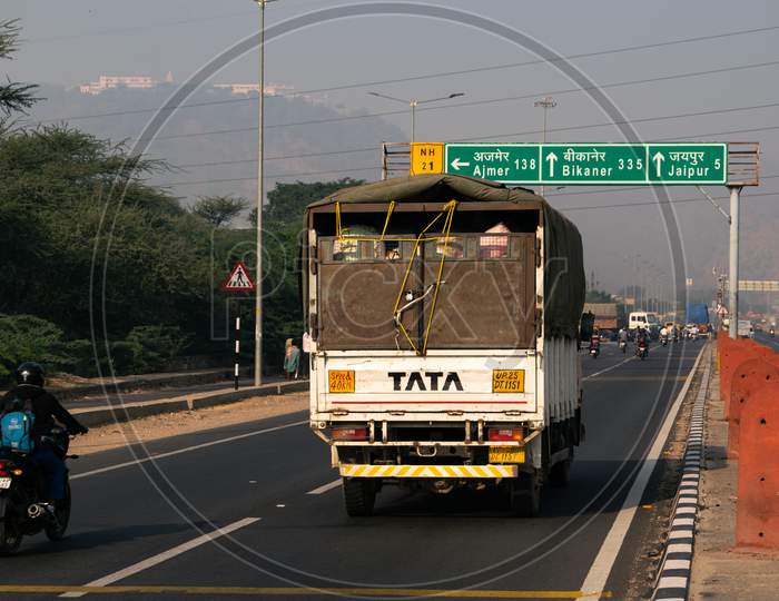A truck or lorry carrying loads on national highway NH 21 heading towards Jaipur