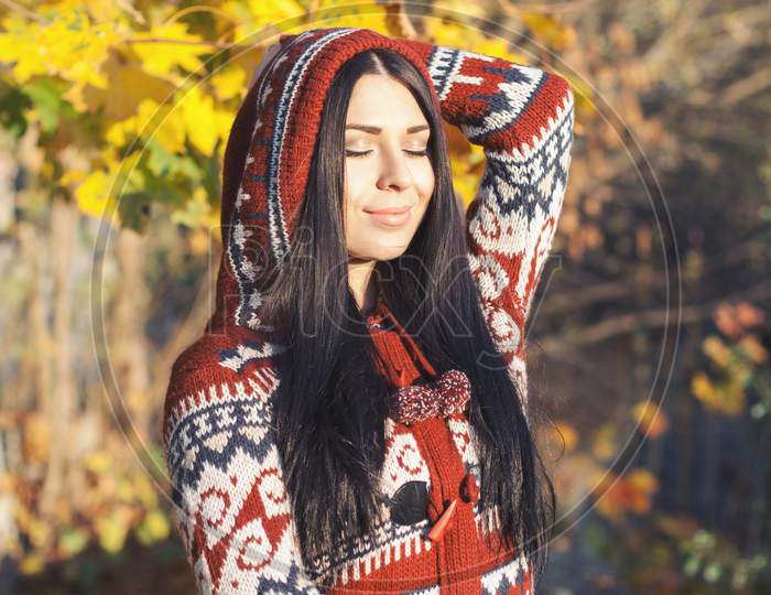 Beautiful Woman In Autumn