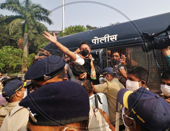 Supporters of India's ruling Bharatiya Janata Party (BJP) are detained by police officials during a protest against the arrest of Arnab Goswami, one of India's top TV news anchors, in Mumbai, India, November 4, 2020.