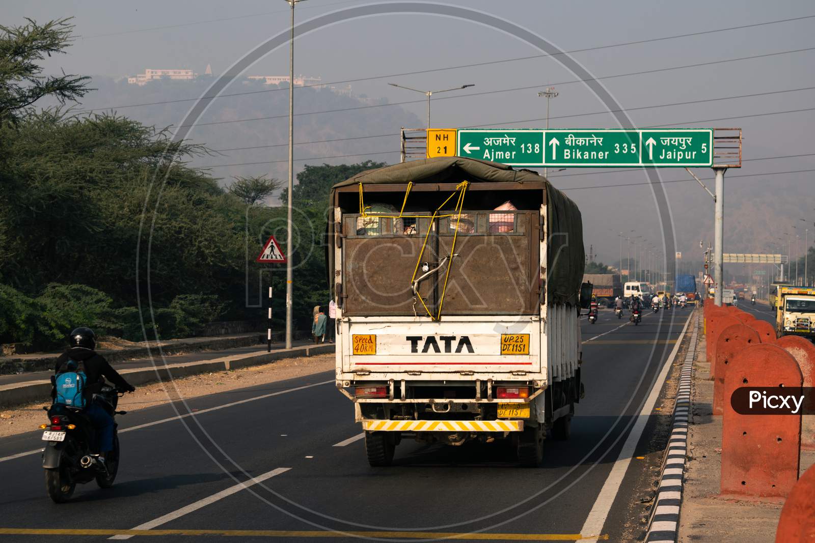 A truck or lorry carrying loads on national highway NH 21 heading towards Jaipur