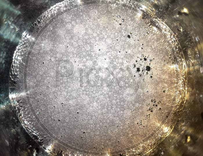 Abstract Of White Soap Bubbles In A Glass