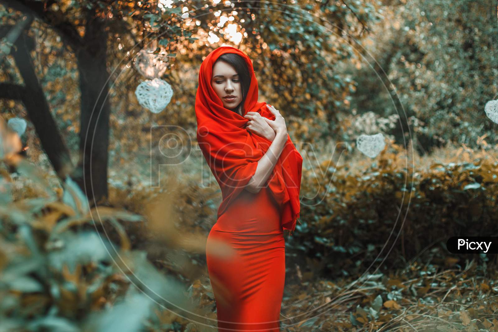 Glorious Girl In A Red Dress In The Garden With Hearts