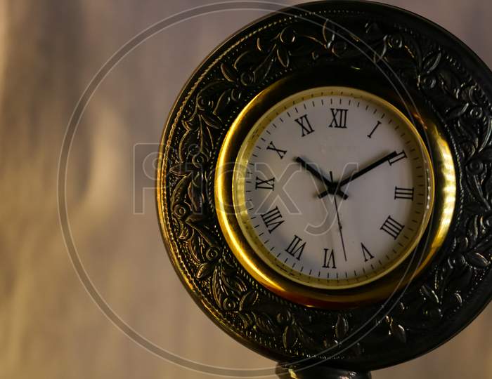 closeup of an old antique clock face on white background
