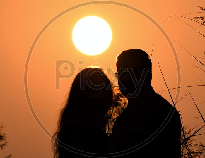 Sunrise with beautiful couples