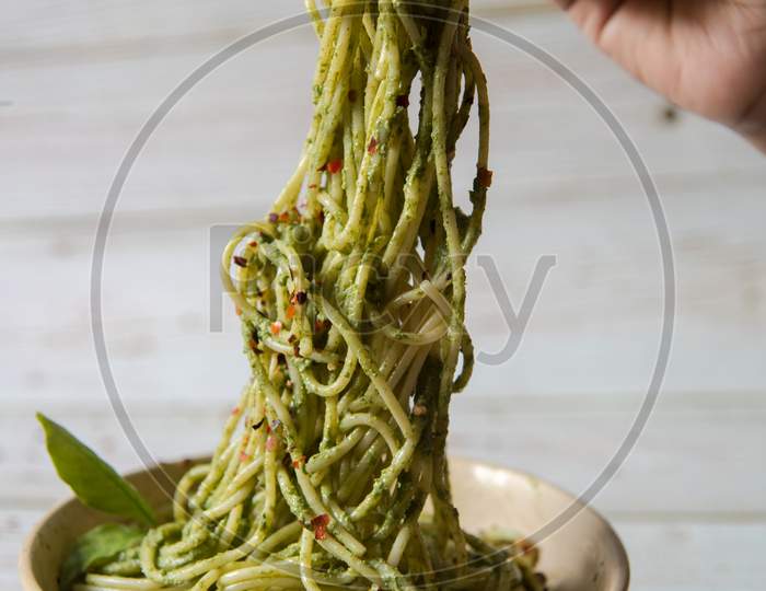 Close up of popular snacks pasta with pesto