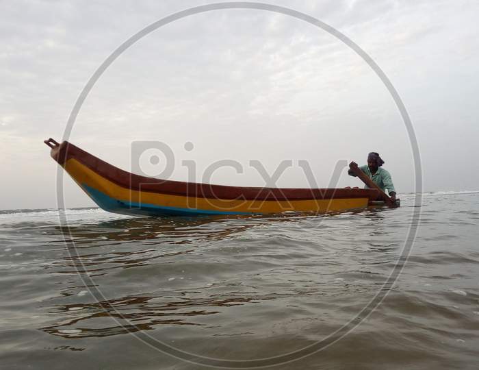 A fishermen on a boat