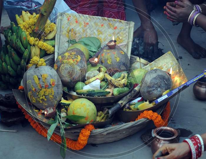The offering to Sun God in Chat festival by the devotees.