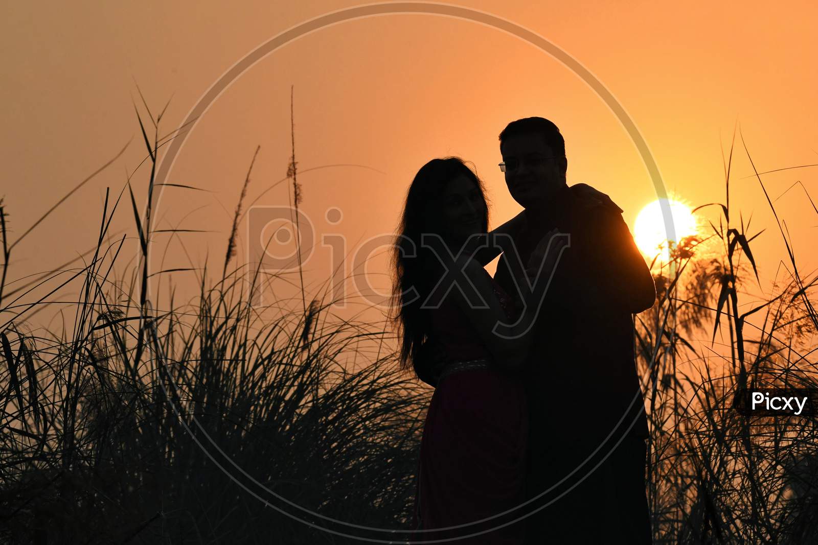 Couples in Sunrise