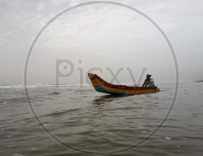 A fishermen on a boat