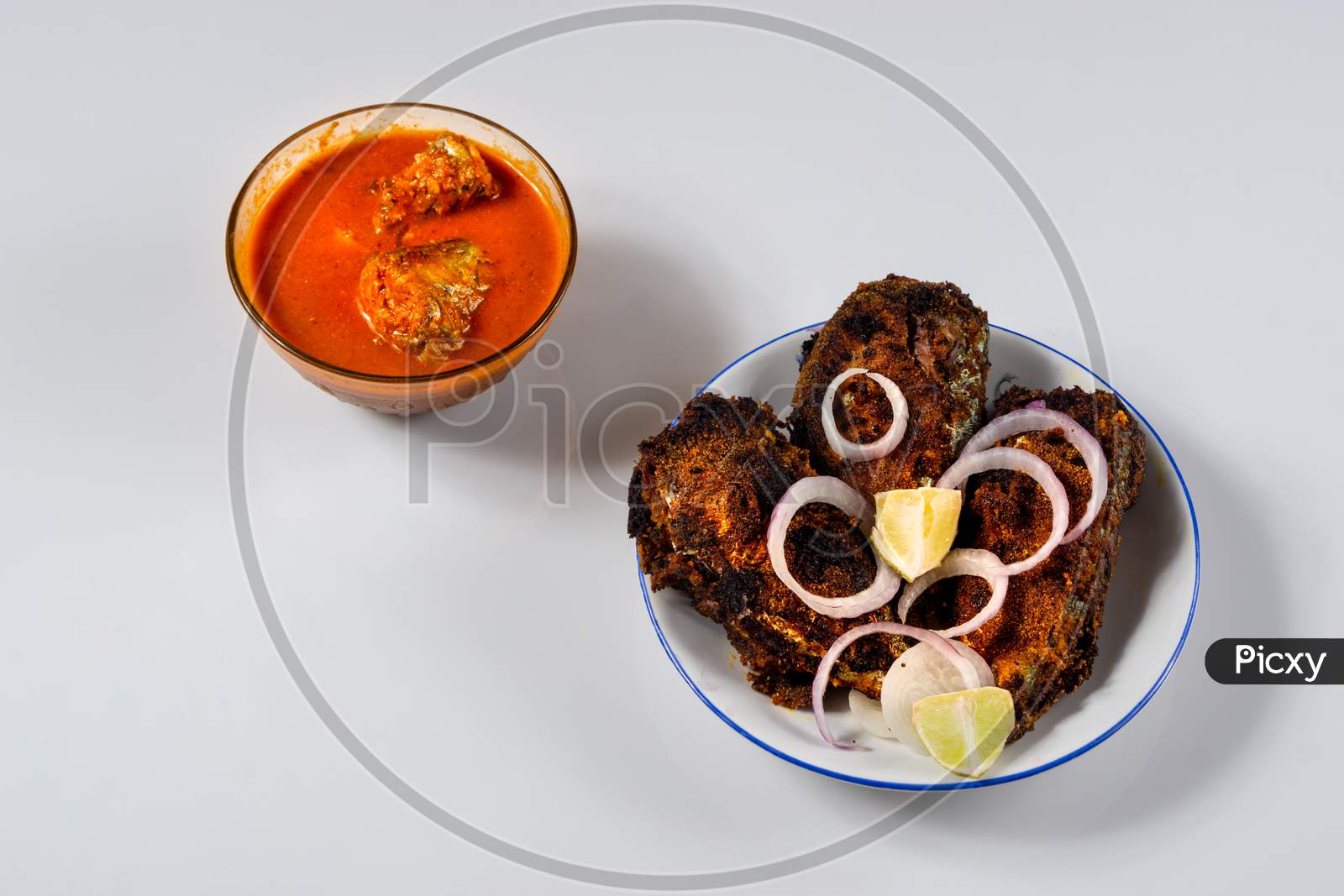 Sea Food Spicy Fish Fry On A White Plate