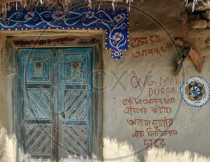 Bengali village door with ancient art.