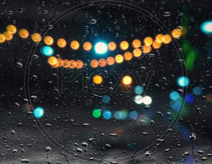 RAINDROPS ON CAR WINDOW GLASS