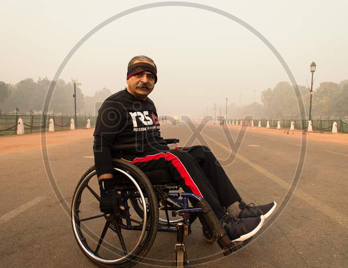 A wheelchair bound man practicing for marathon