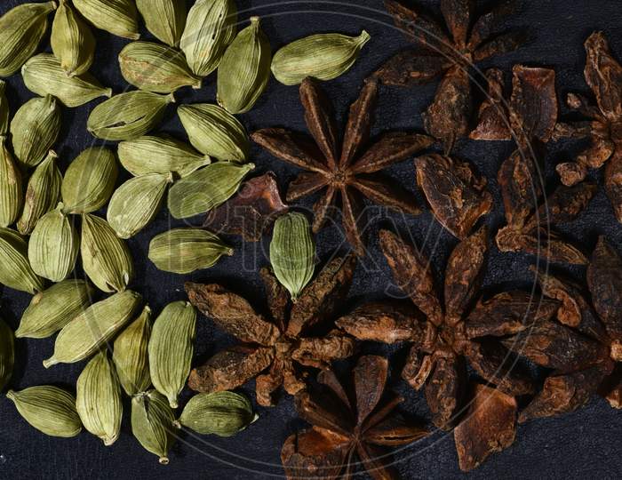 Star Anise (Chakra Phul)  and Cardamom closeup photos.Indian spices.