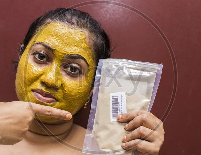 Image Of Close Up Of A Woman With Cosmetic Facial Mask All Over Her 0963
