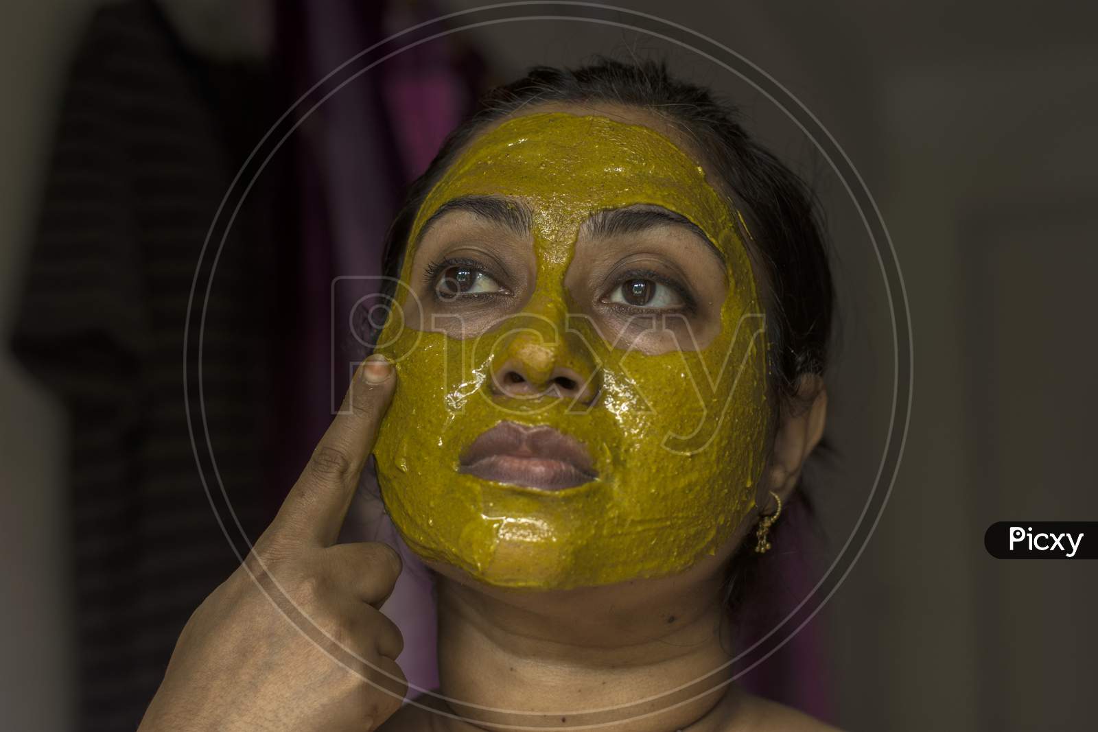 Image Of Close Up Of A Woman With Cosmetic Facial Mask All Over Her Face Ic512843 Picxy