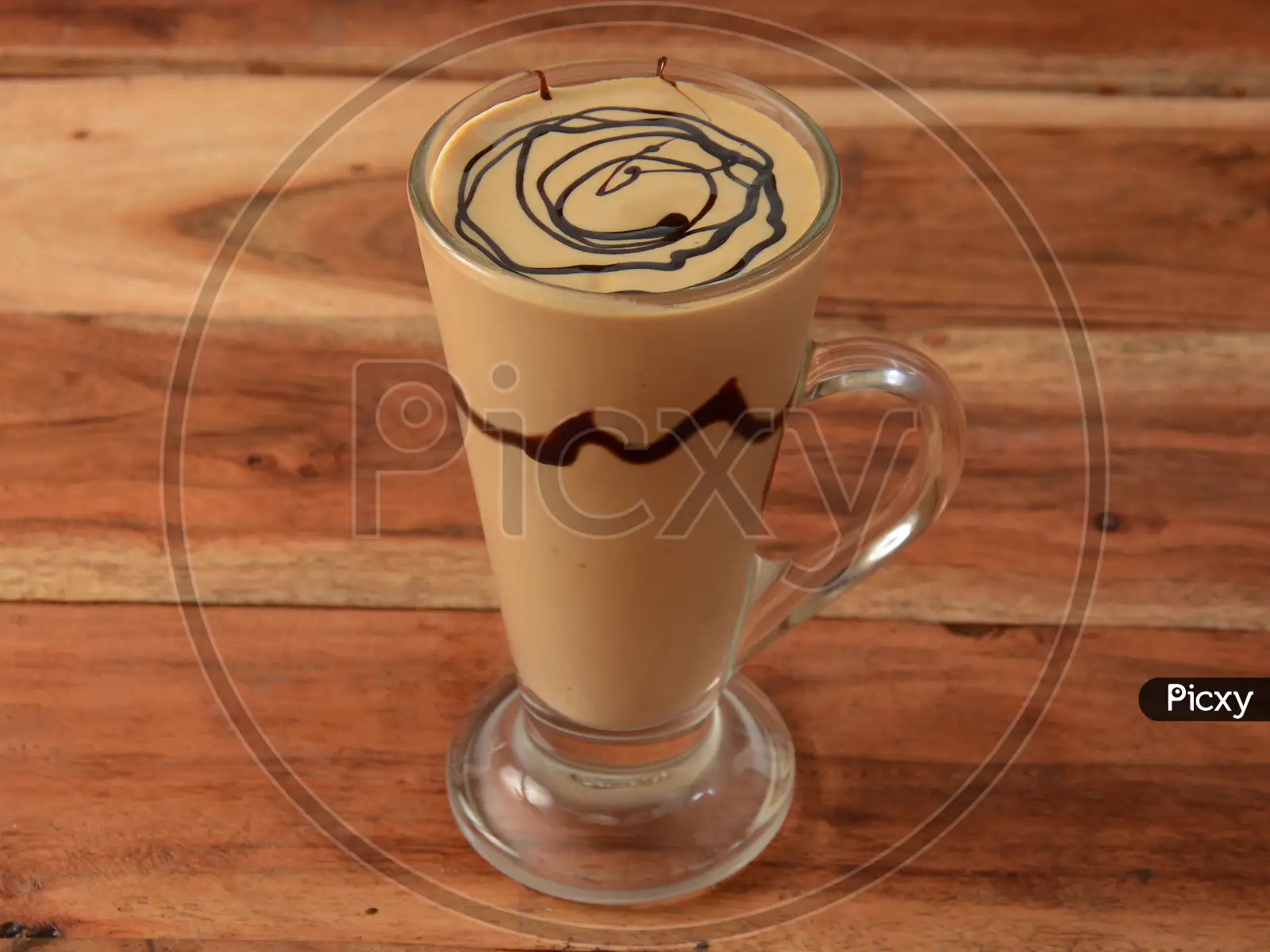 Iced coffee in tall glass. One sweet cold latte with whipped cream, with  chemex coffee maker on dark brown background copy space Stock Photo - Alamy