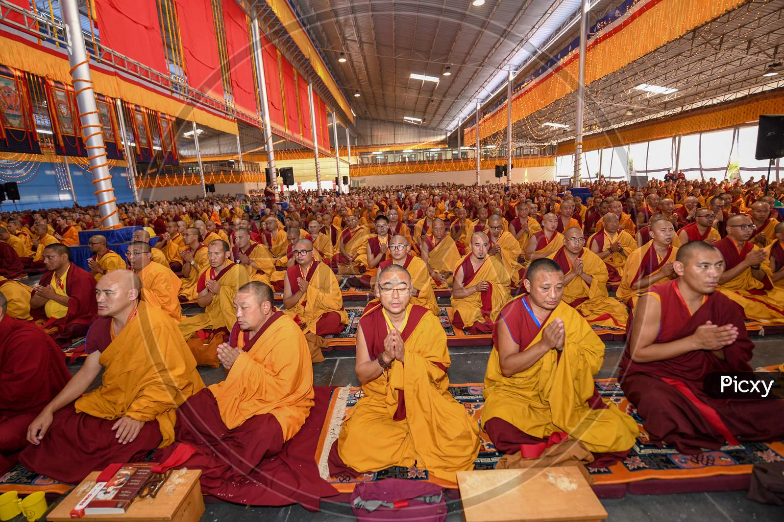 Buddhist Monks And Devotees