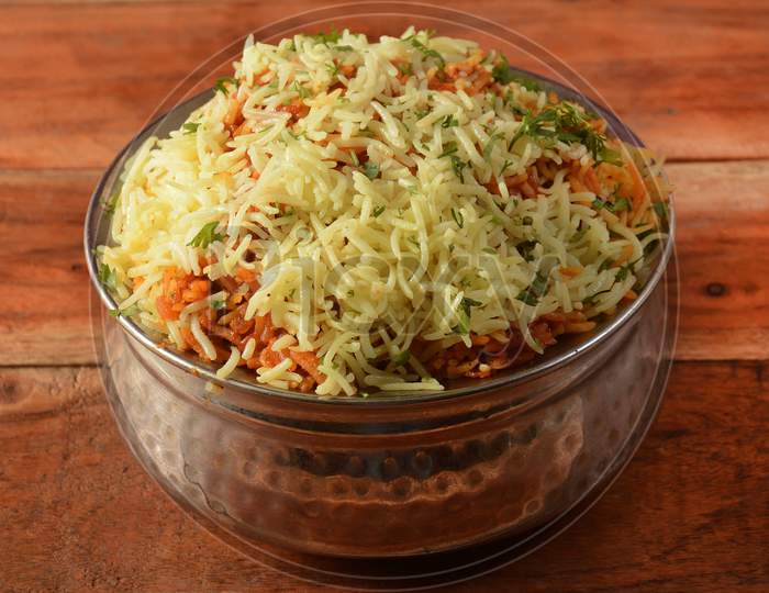 Traditional Hyderabadi Vegetable / Veg Dum Biryani With Mixed Veggies Served With Mixed Raita, Selective Focus
