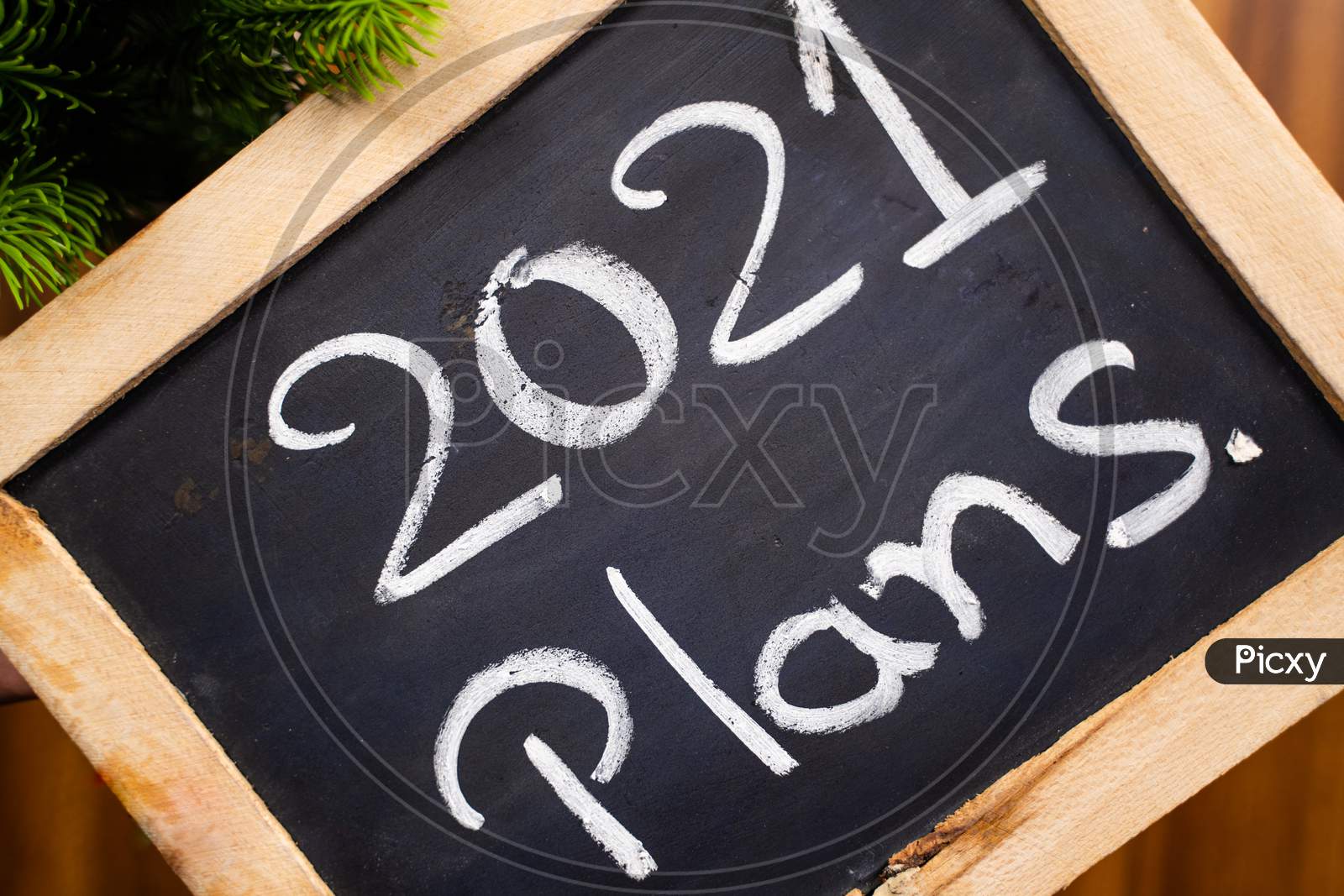 Hand Written 2021 Plans On School Slate - Concept Of New Year 2021 Planning.
