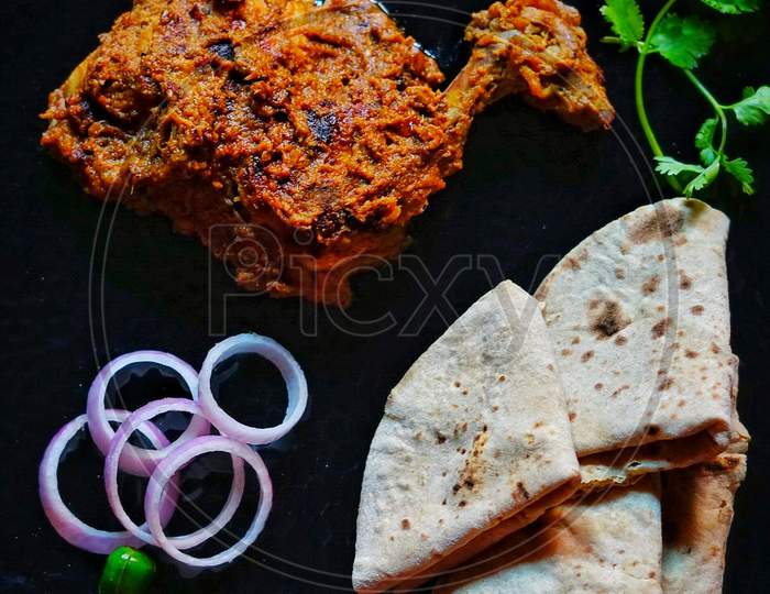 Spicy chicken with roti
