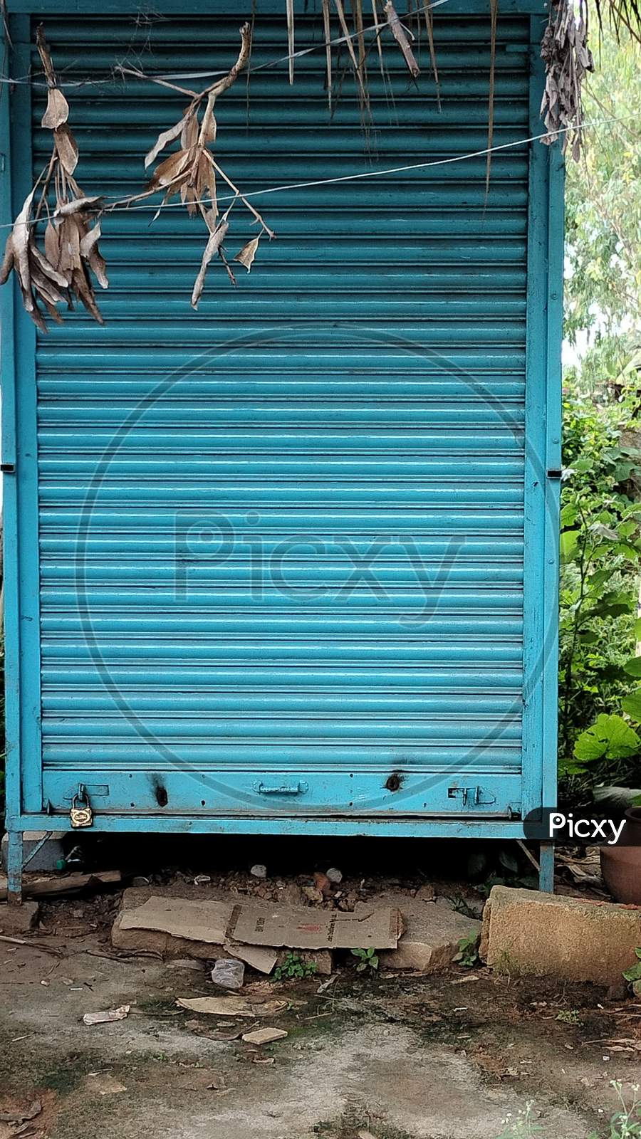 Image of A closed shutter of a shop OP491640 Picxy