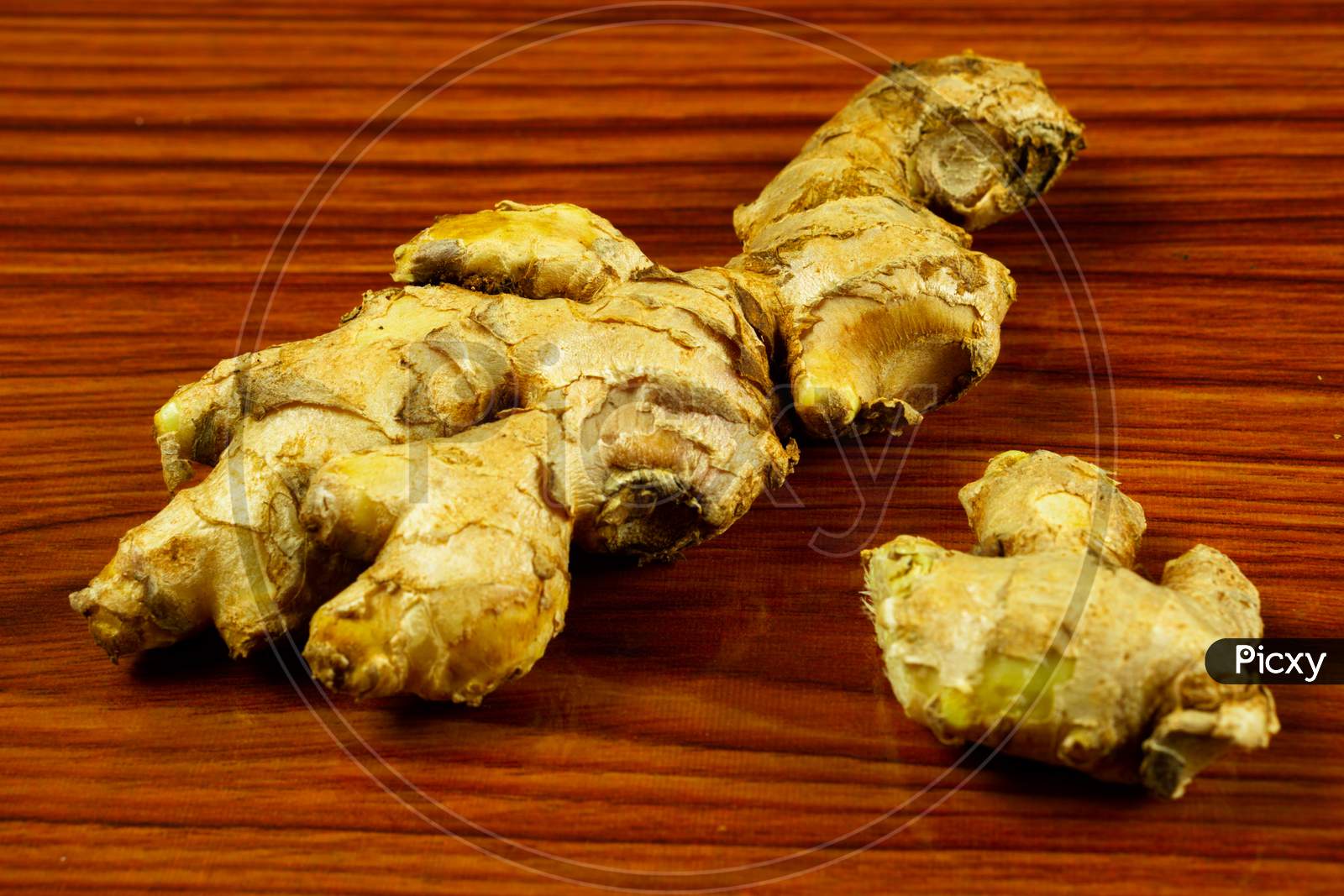 Raw Ginger Pieces On The Table