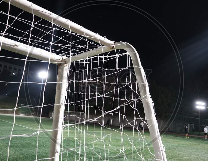 Closeup View Of Goal Net In A Soccer Playground