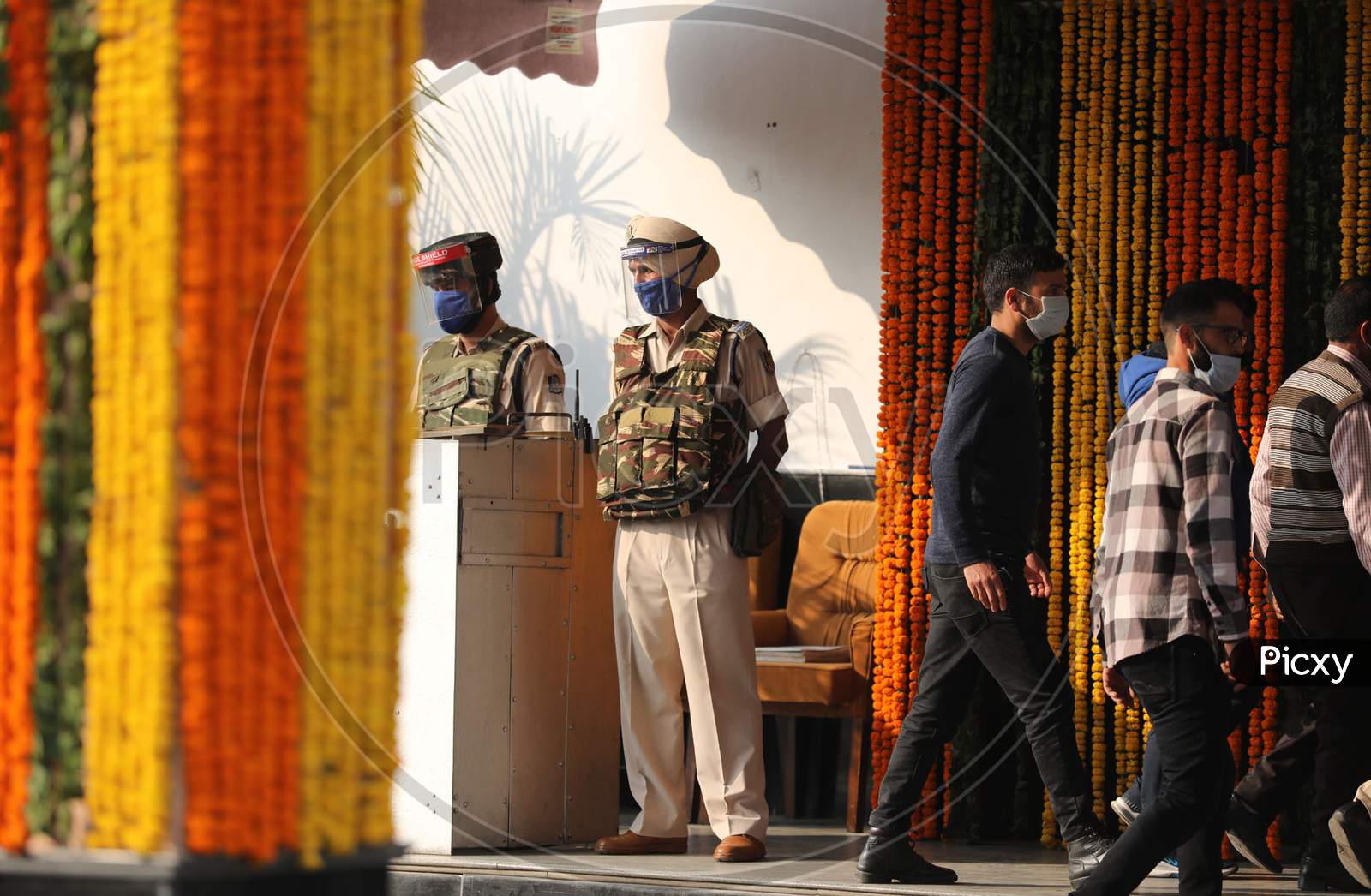 security personnel stands guard outside the Civil Secretariat as it reopens following the annual 'Darbar Move', in Jammu,Nov. 9, 2020