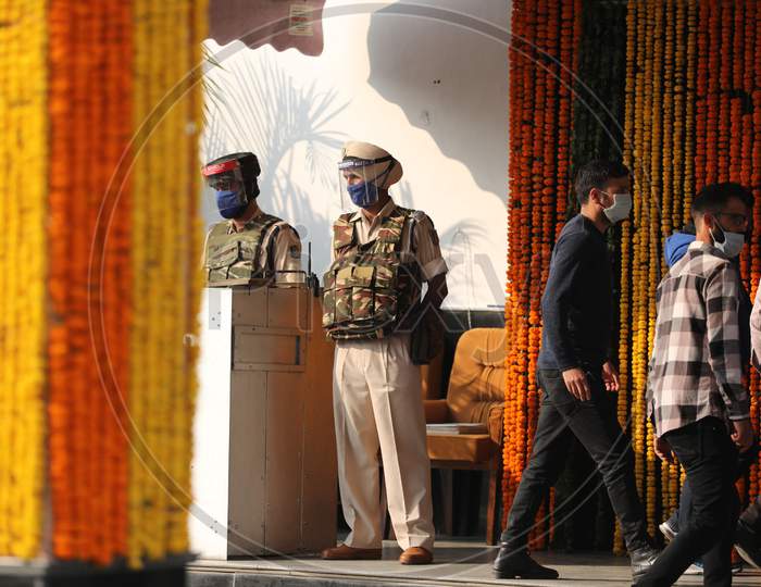 security personnel stands guard outside the Civil Secretariat as it reopens following the annual 'Darbar Move', in Jammu,Nov. 9, 2020