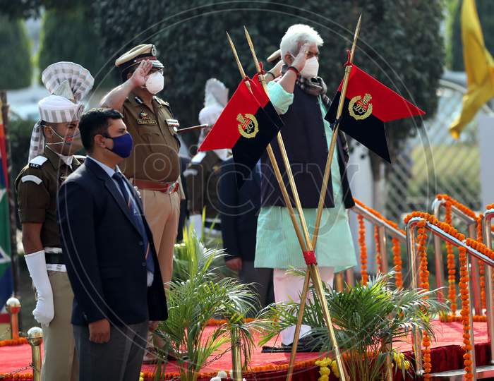 Jammu and Kashmir Lieutenant Governor Manoj Sinha, inspects a guard of honor during the annual reopening of the former state's winter capital at the civil secretariat in Jammu, 9 November.2020.