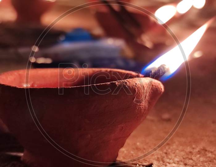 Diwali celebration in India with diya or oil lamp, festival of lights deepawali