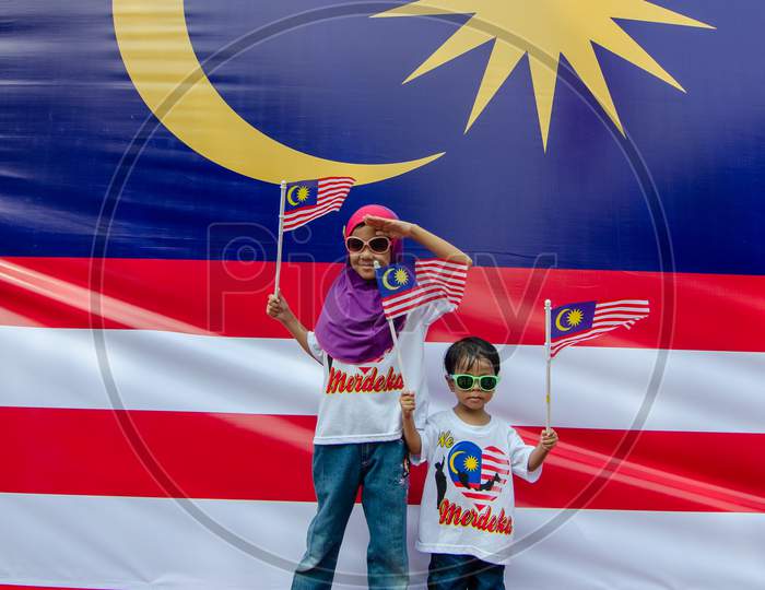 Two Children Hold Malaysia Flag Celebrate Malaysia Independence Day