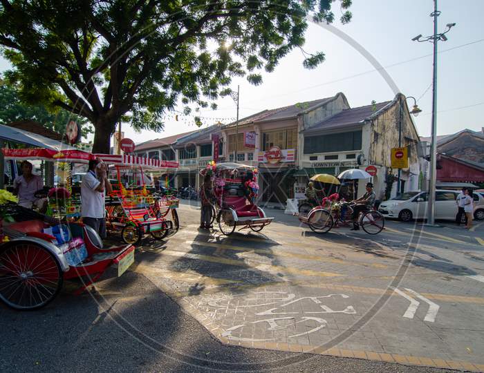 Rickshaw Driver At The Bicycle Friendly Street