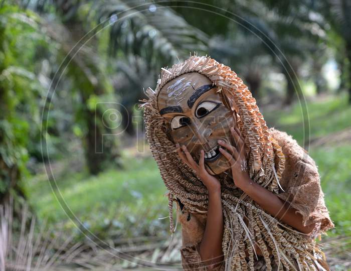 Malaysia Aborigine Mah Meri With Mask At Oil Palm Estate