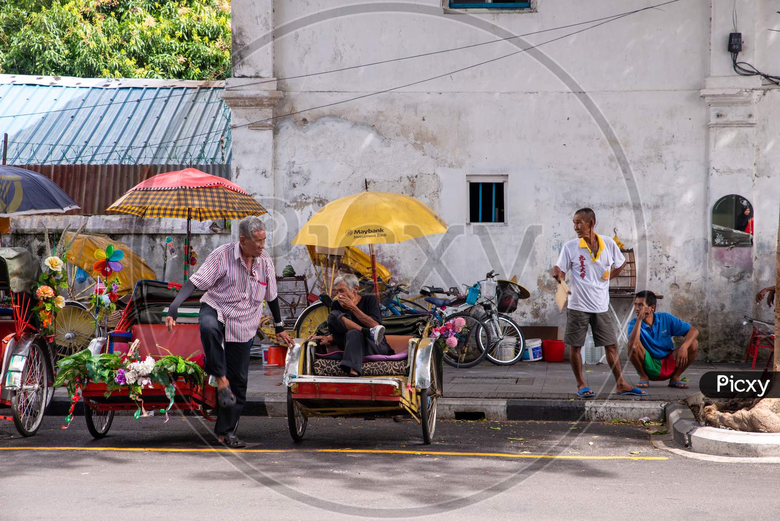 Rickshaw Driver Rest Together At The Street