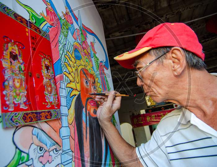 A Chinese Artist Draw A "Door God" At The Temple