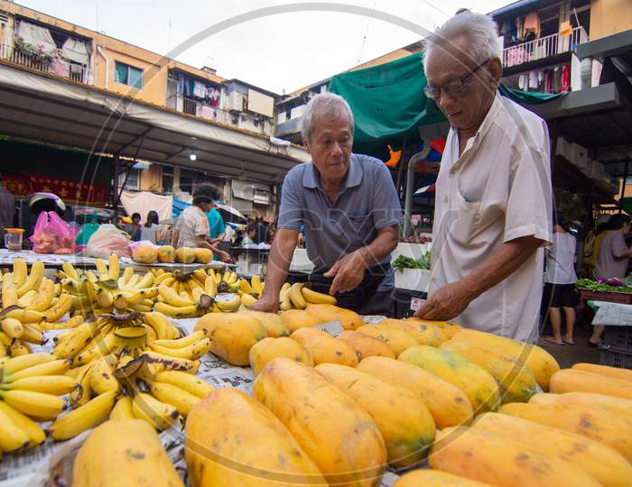 Hawker Sell Papaya And Banana At Market