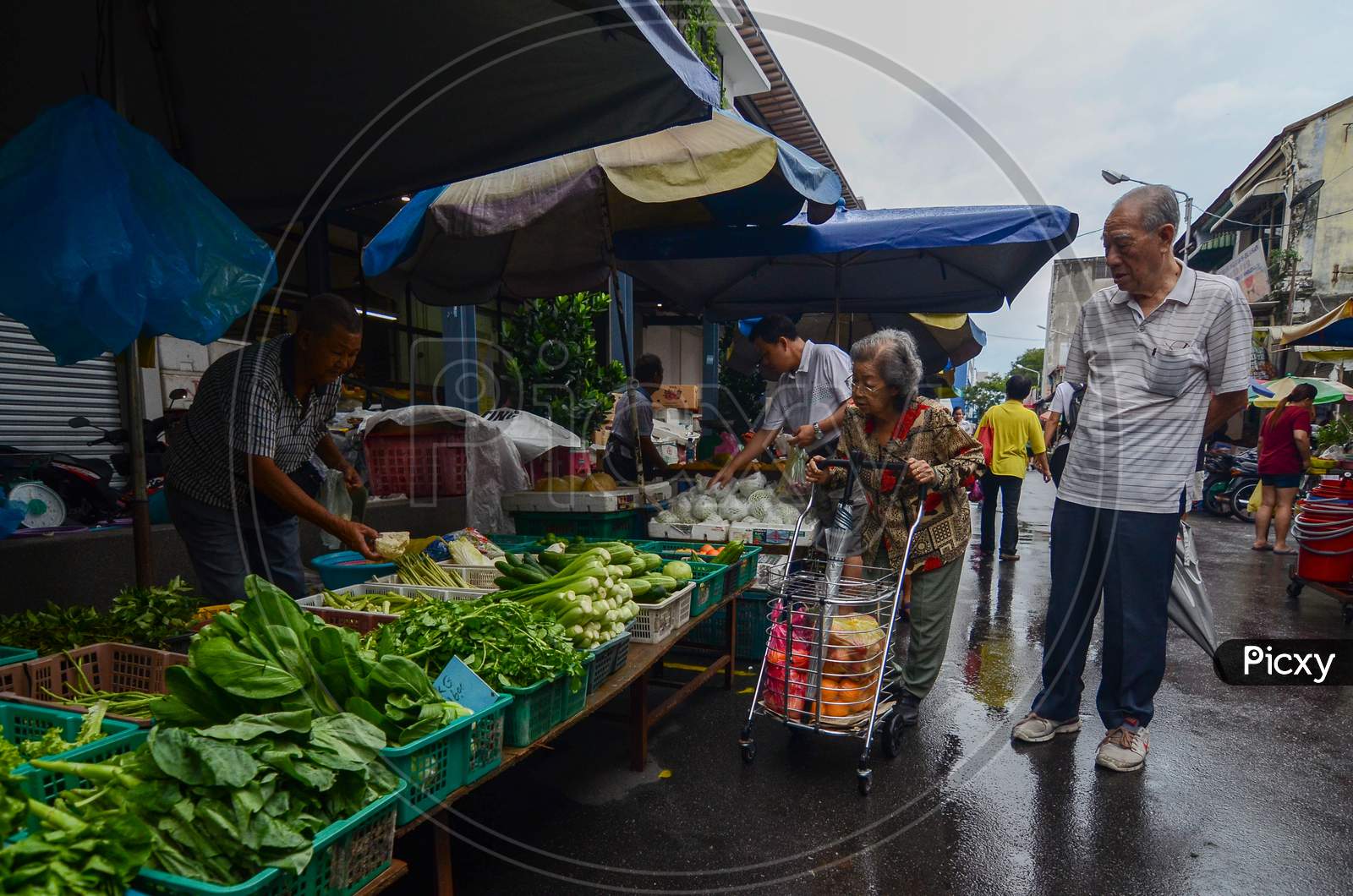 People Purchase The Vegetables At Wet Market In Morning