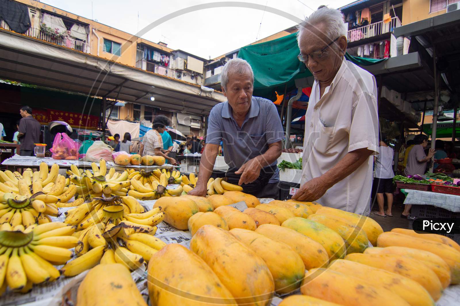 Hawker Sell Papaya And Banana At Market