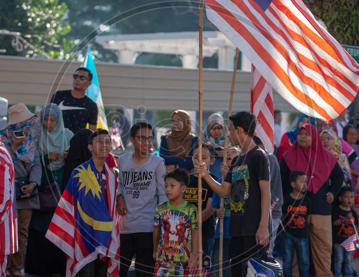 Image of Malaysian With Jalur Gemilang Costume Stand Together 