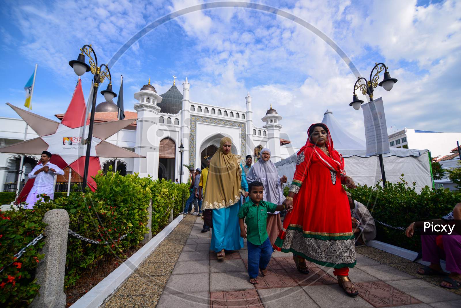 Indian Muslim Family Leave The Mosque After Pray