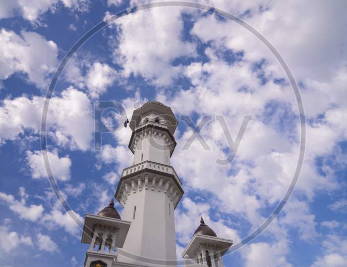 Architecture Minaret Of Masjid Kapitan Keling Mosque Under Hot Blue Sky
